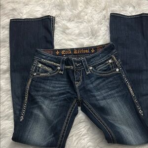 Rock Revival Blue Boot Cut Jeans with Distressed Detailing